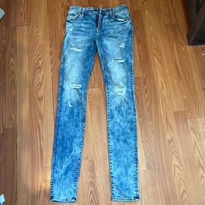 AMERICAN EAGLE RIPPED STACKED SKINNY JEANS